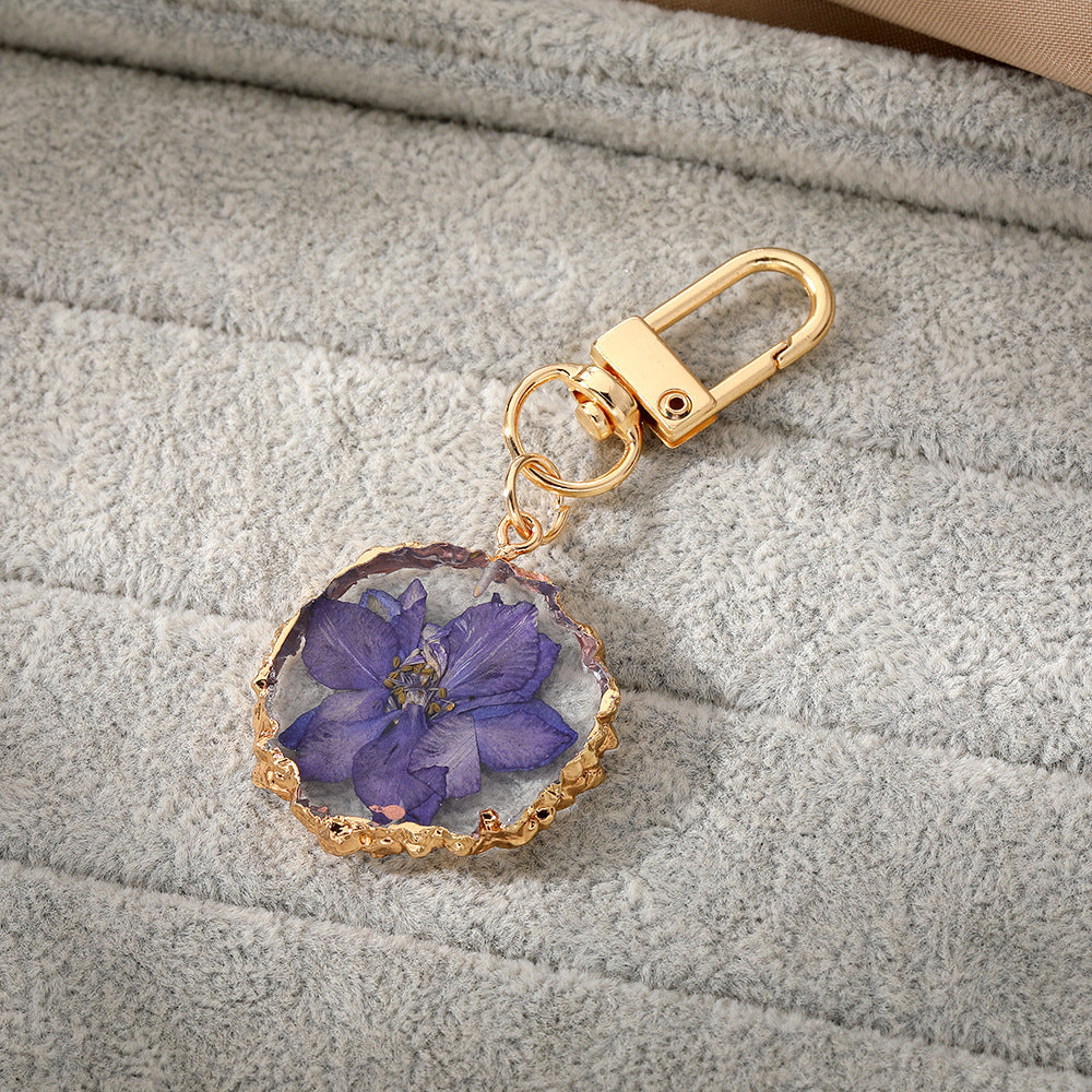 Wholesale Creative Frosted Epoxy Dried Flower December Flower Keychain